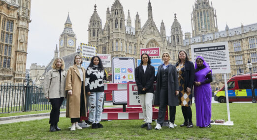 Campaigners outside the Houses of Parliament.