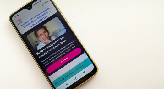 Refuge's new website displayed on a phone